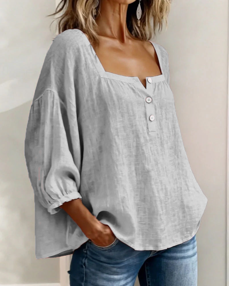 Stylish women's square neck linen shirt, relaxed fit, elegant balloon sleeves. Ideal for summer versatility.