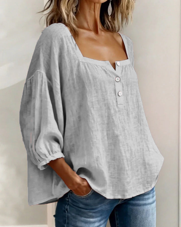 Stylish women's square neck linen shirt, relaxed fit, elegant balloon sleeves. Ideal for summer versatility.