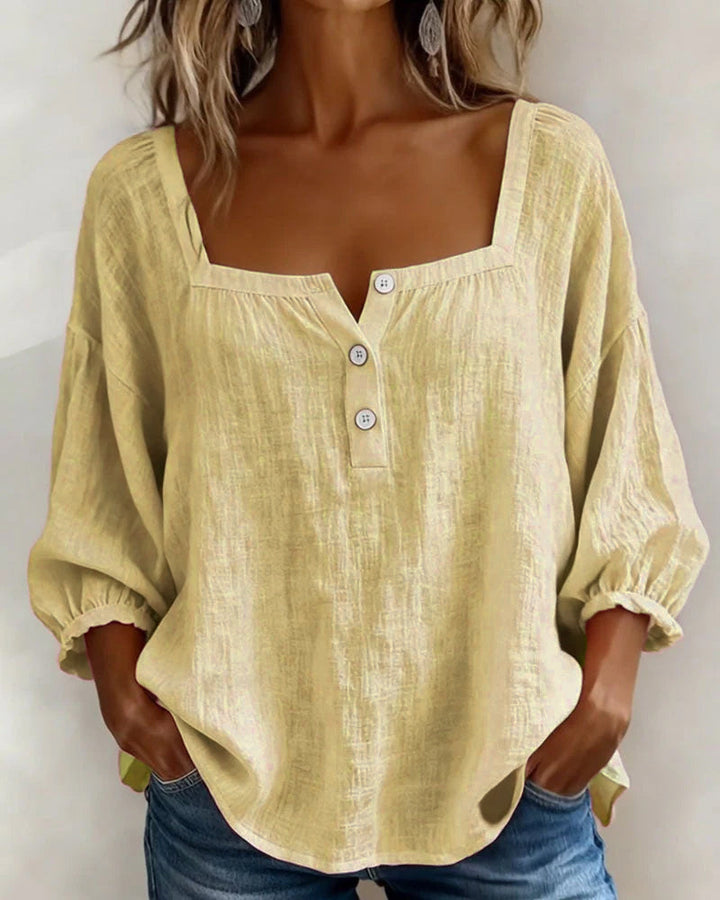 Comfortable women's linen top, square neck, trendy balloon sleeves. A versatile, relaxed fit for everyday style.