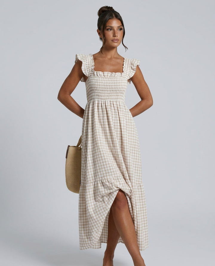 Casual chic women's smocked gingham maxi dress with ruffle sleeves and a stylish square neck.