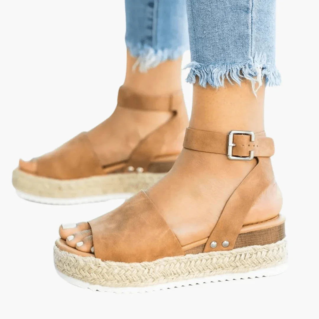 Chic women's peep-toe leopard print espadrille wedge sandals, perfect for summer fashion & comfort.