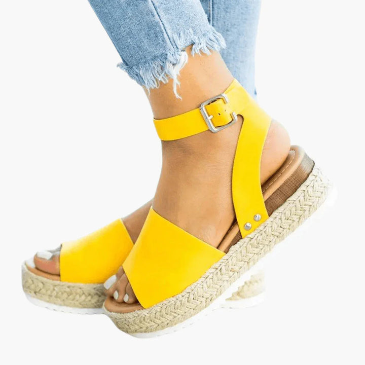 Versatile women's leopard print espadrille wedge sandals, ideal for casual wear or holiday outfits.