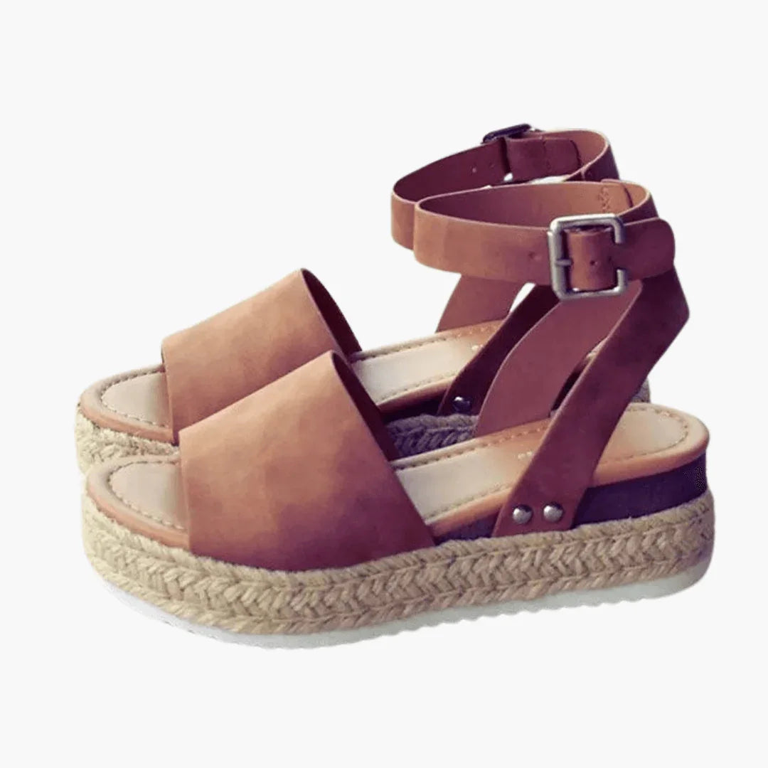 Fashionable women's leopard print espadrille wedges, a must-have for summer footwear collections.