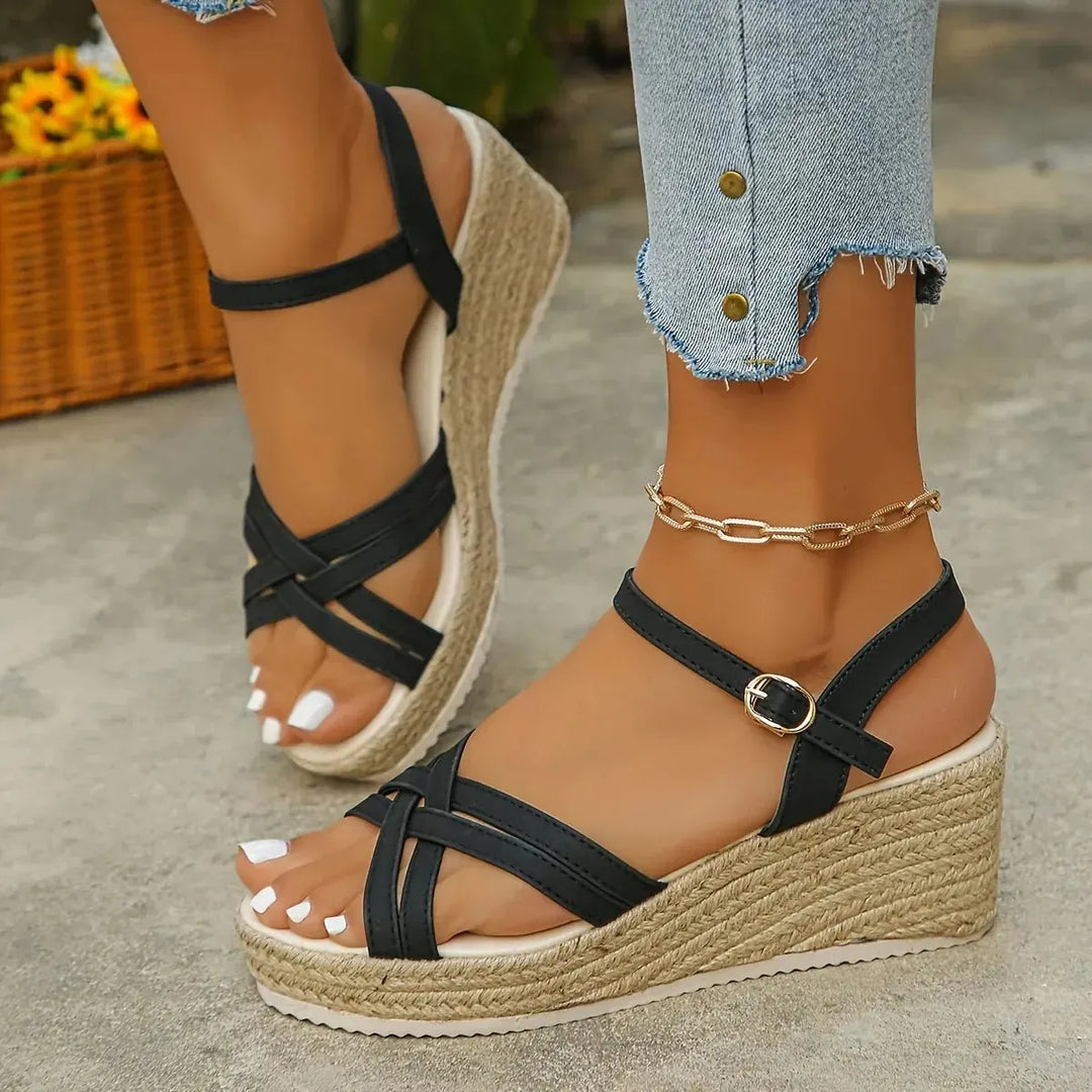 Refined women's strappy espadrille wedge sandals, an elegant platform footwear choice for summer and vacation.