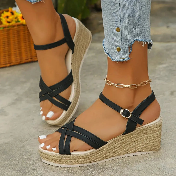 Refined women's strappy espadrille wedge sandals, an elegant platform footwear choice for summer and vacation.
