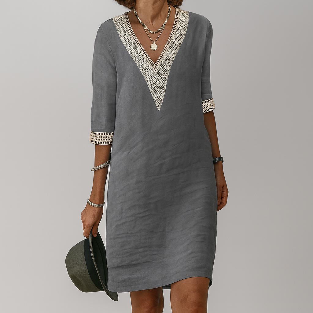 Stylish knee-length women's summer dress with refined crochet trim and flattering V-neck.