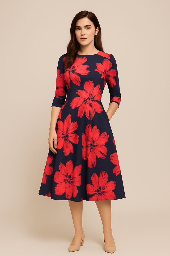 Chic women's floral A-line midi cocktail dress, ideal for parties & special occasions. Features puffed sleeves & round neck.