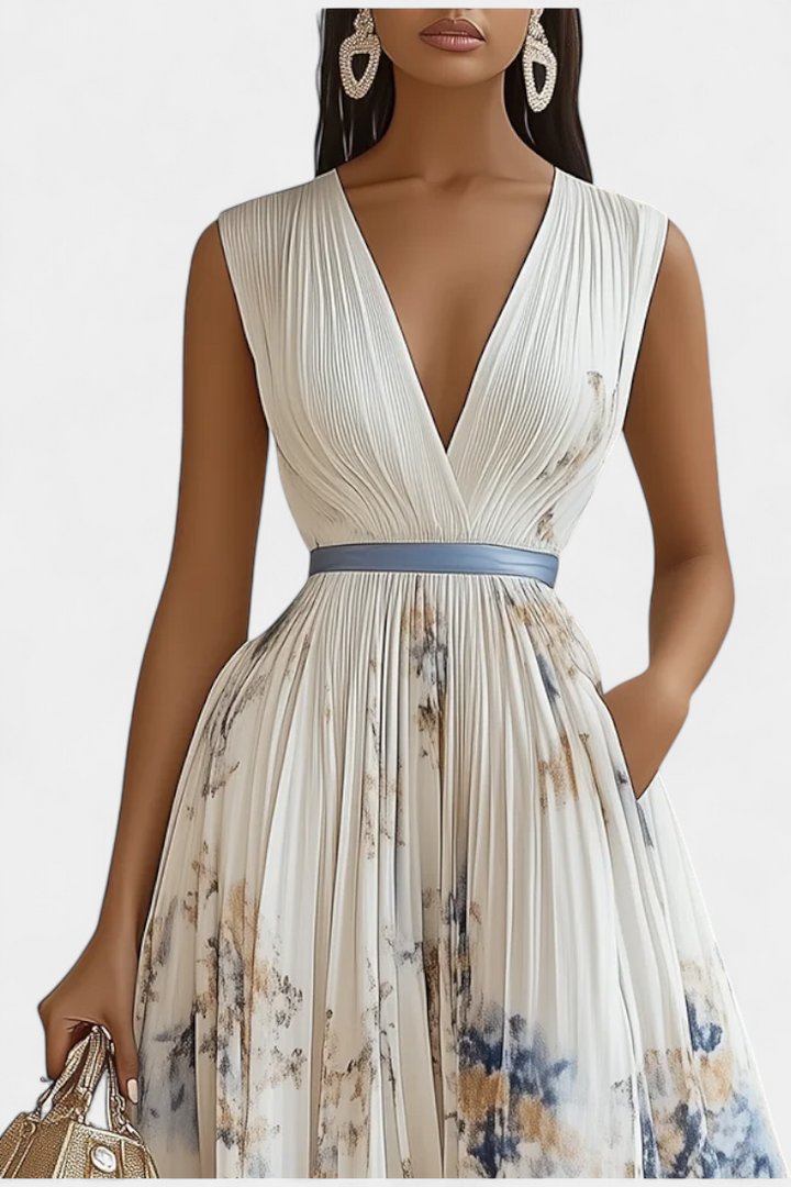 Women's A-line pleated floral midi dress, ideal for races, garden parties & summer events. Elegant daytime wear.