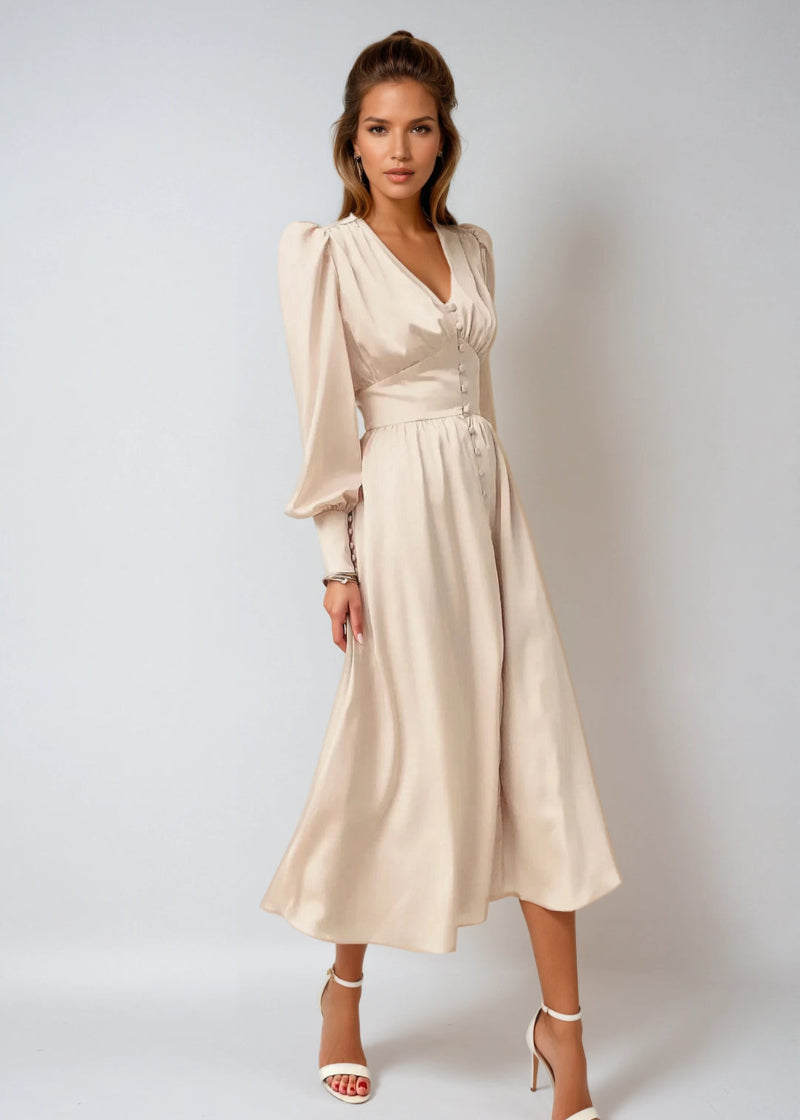 Women's V-neck maxi dress featuring beautiful lantern sleeves, a flowing design for special occasions.