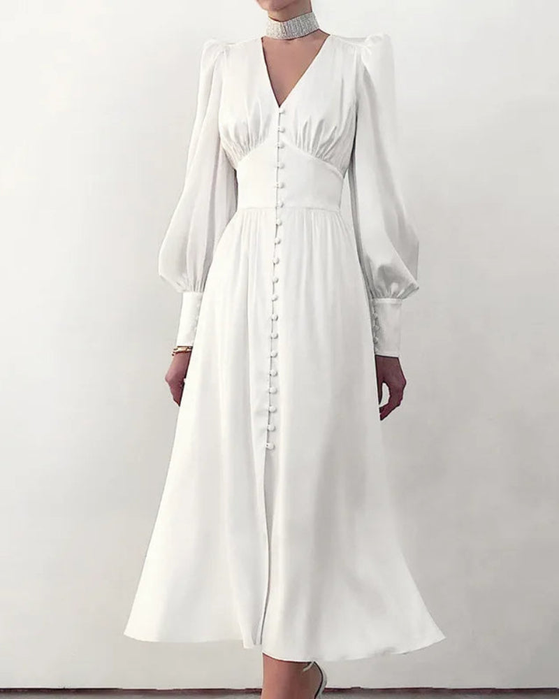 Elegant women's races maxi dress with V-neck & flowing lantern sleeves, ideal for events.