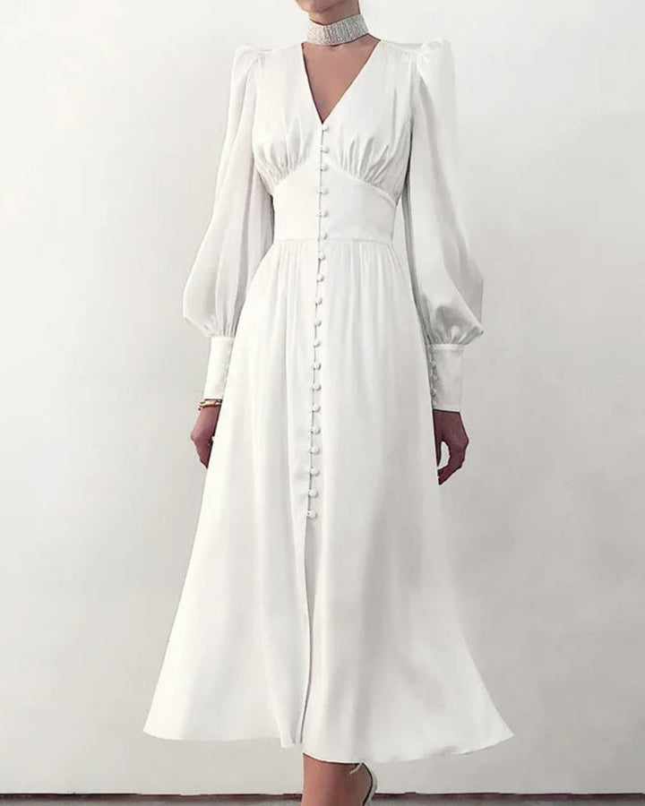 Elegant women's races maxi dress with V-neck & flowing lantern sleeves, ideal for events.