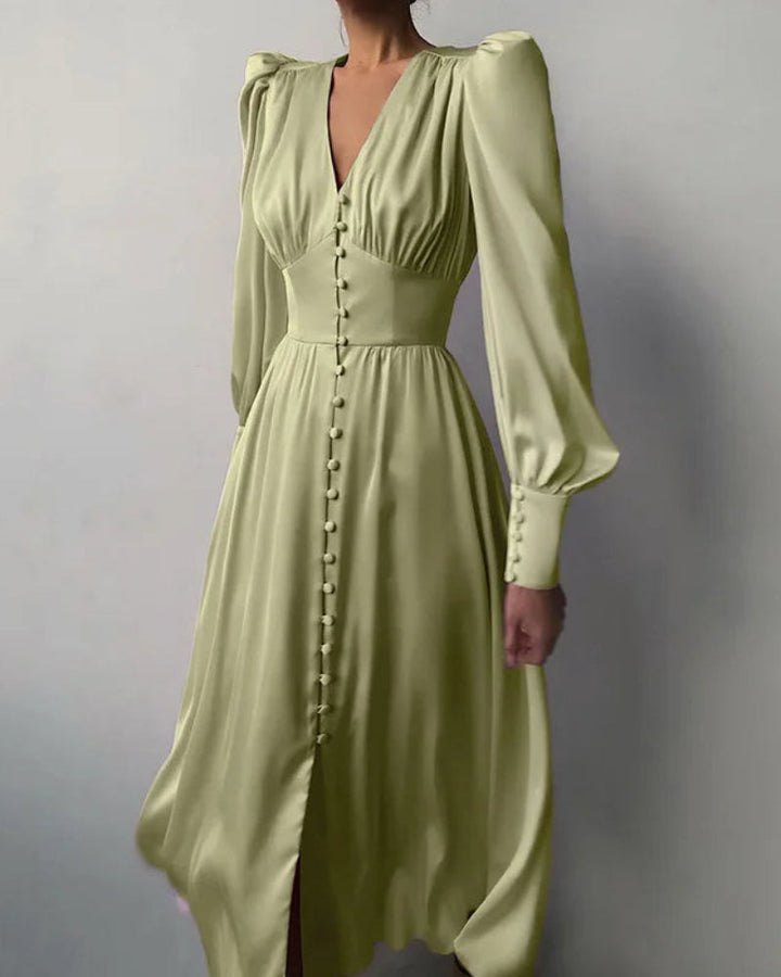 Relaxed V-neck women's maxi dress featuring chic lantern sleeves & a graceful, flowing design.