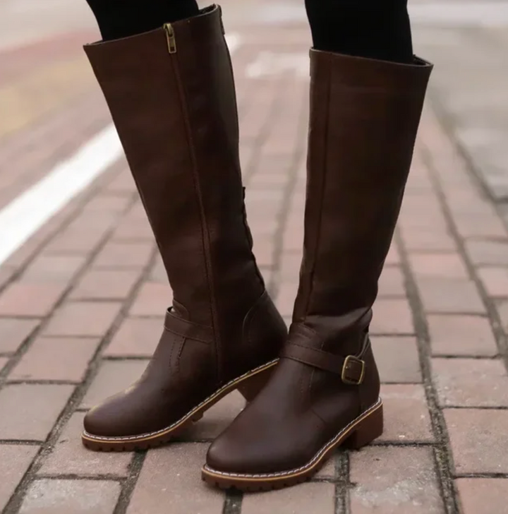 Durable all-weather Emma boots for women, offering superior grip and style.