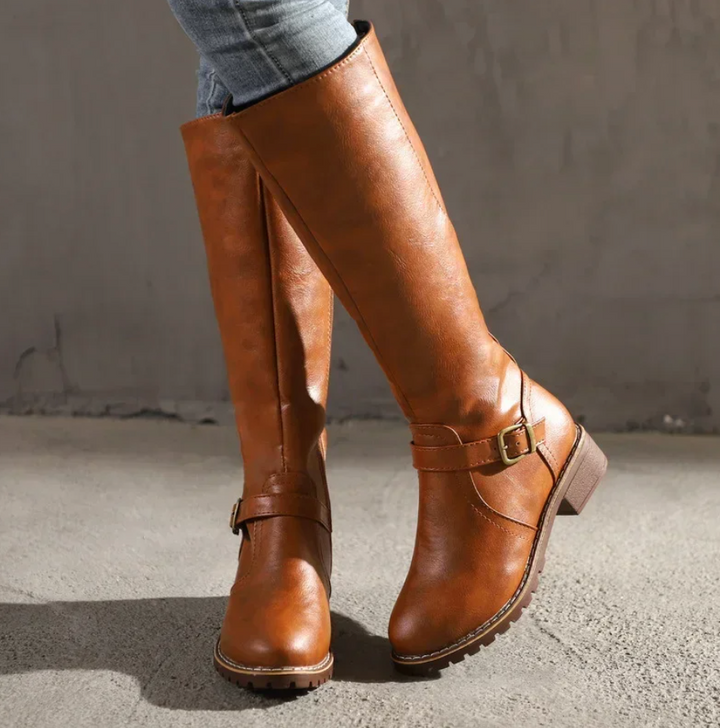 Get all-weather protection with these chic Emma women's non-slip sole boots.