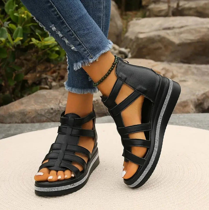 Elegant women's wedge sandals, designed for all-day comfort and stylish lift. Perfect for summer occasions.