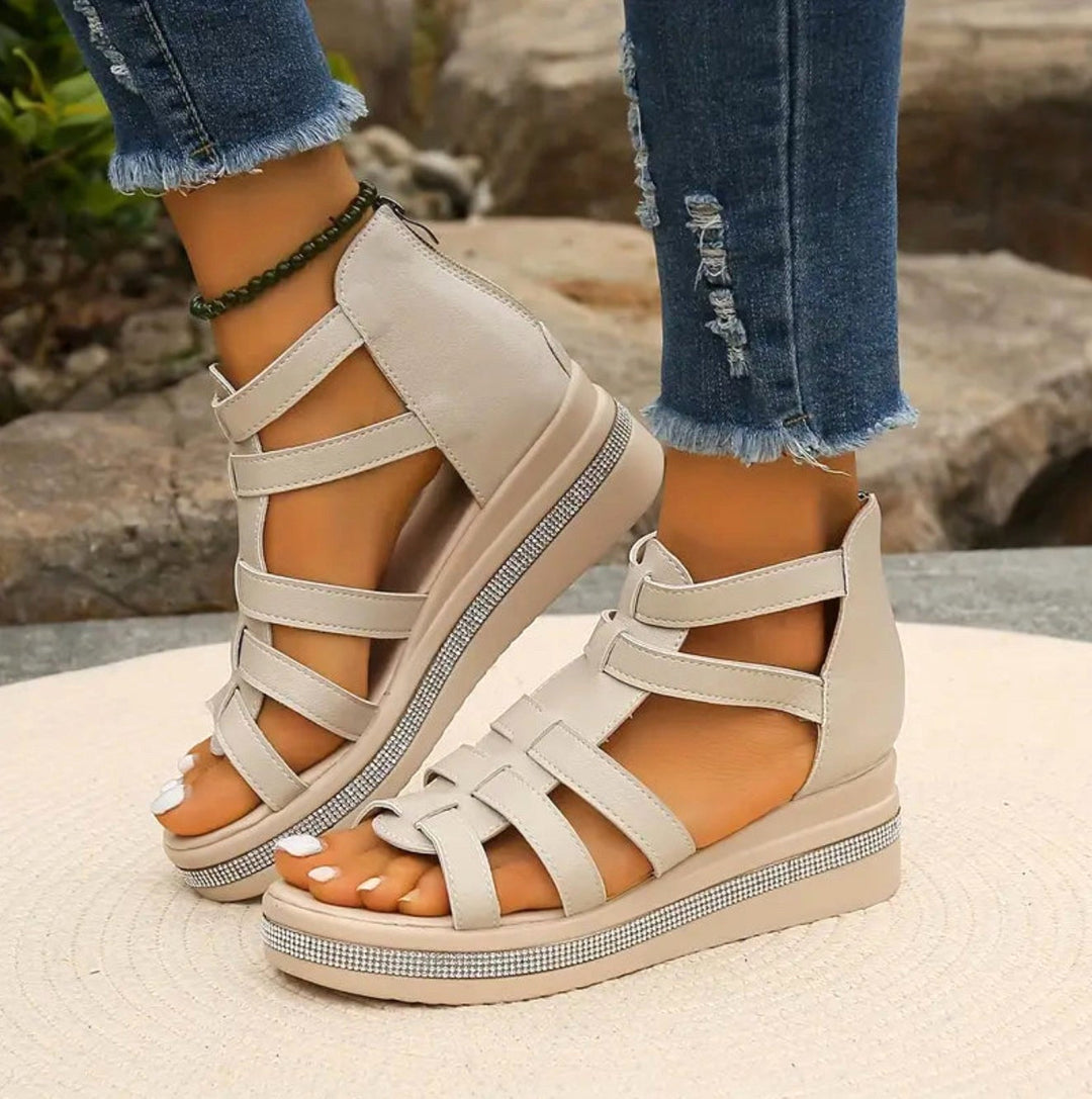 Fashionable women's wedge sandals offering supreme comfort and an elegant all-day lift for sophisticated style.
