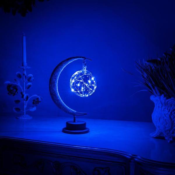 LunaGlow LED Moonlight Lamp creating a warm, ambient glow, perfect for bedroom or living room decor.