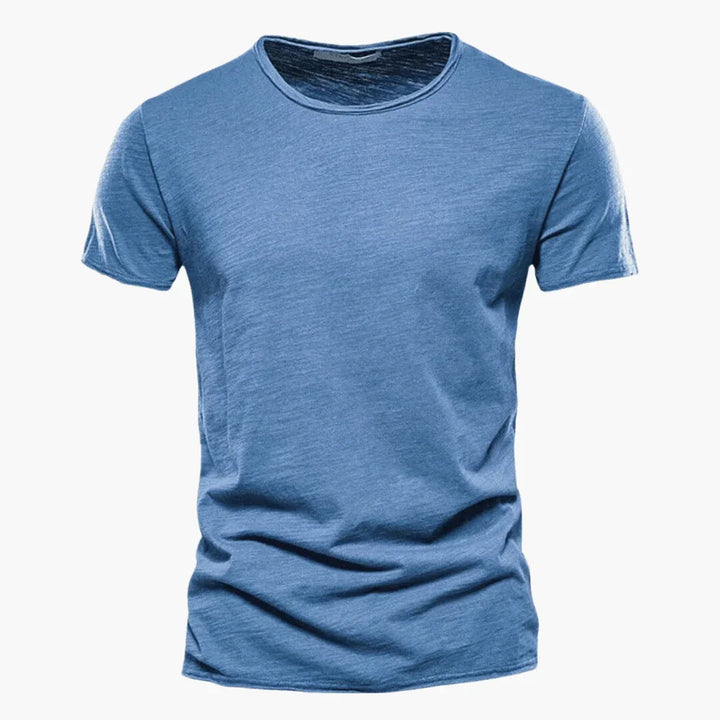 Men's elegant raw-edge crew neck t-shirt in a relaxed fit. Casual & comfortable short sleeve top for everyday wear.