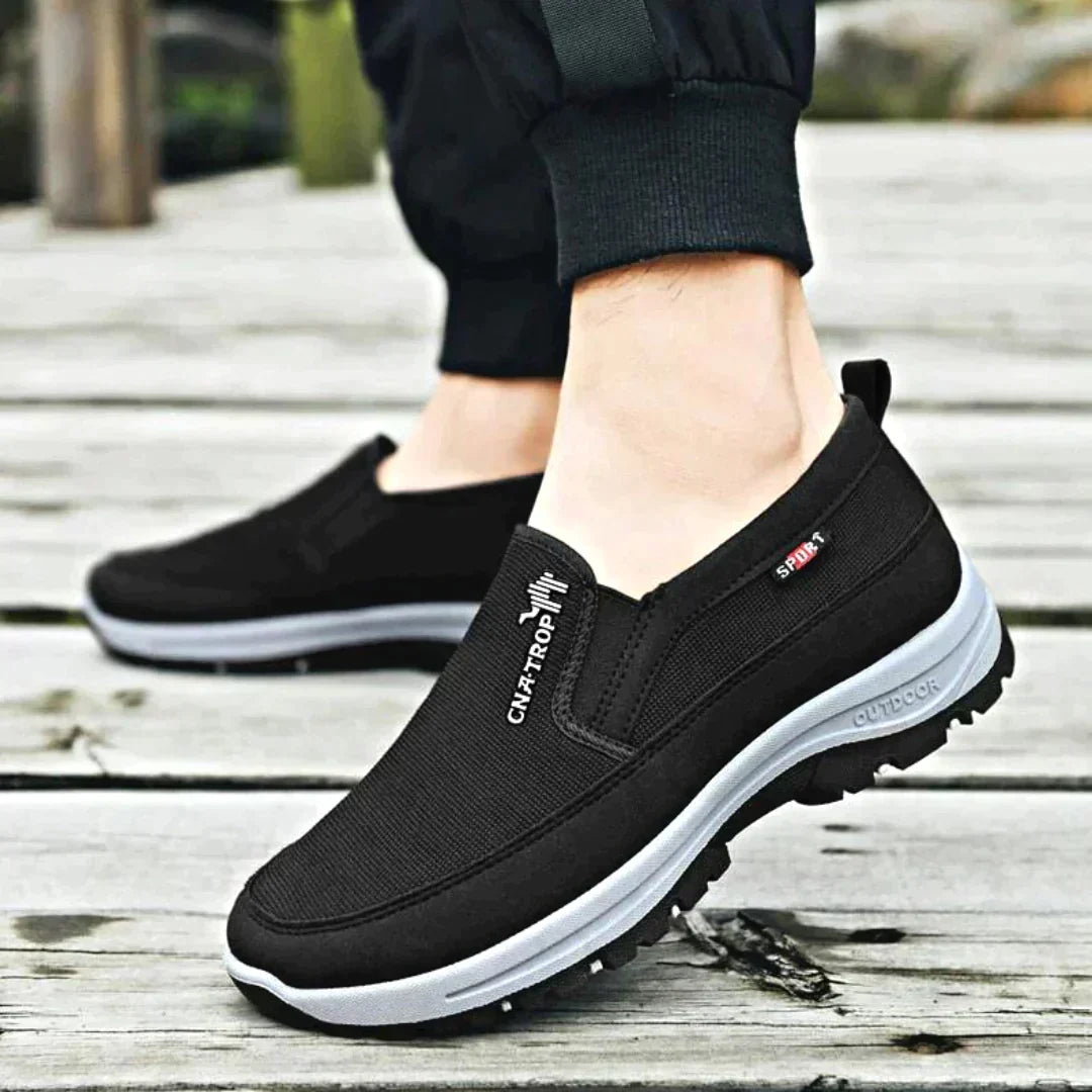 Men's khaki slip-on orthopedic shoes, offering stylish comfort & foot support for everyday wear.