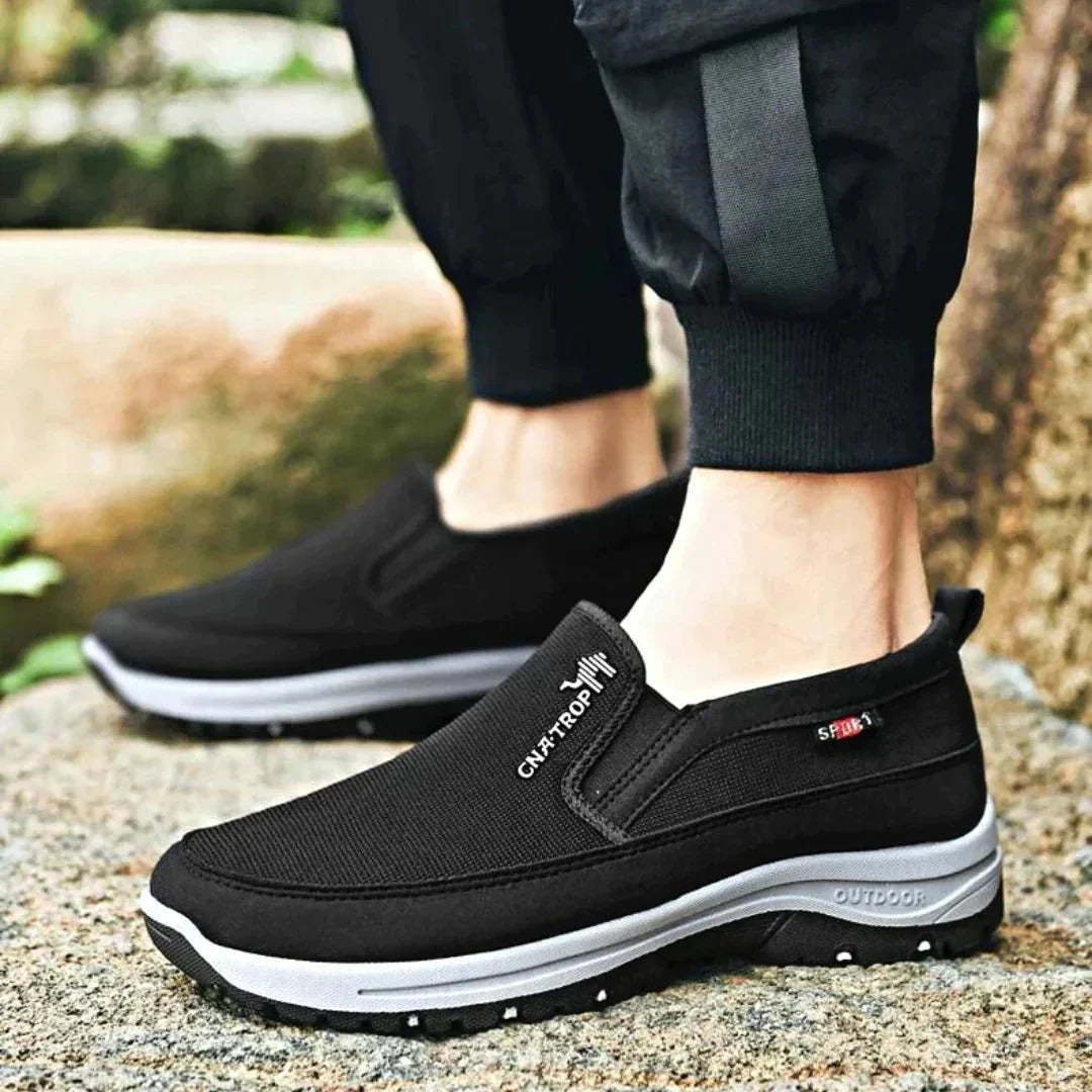 Grey men's athletic casual slip-on shoes for all-day comfort, perfect for walking & foot support.