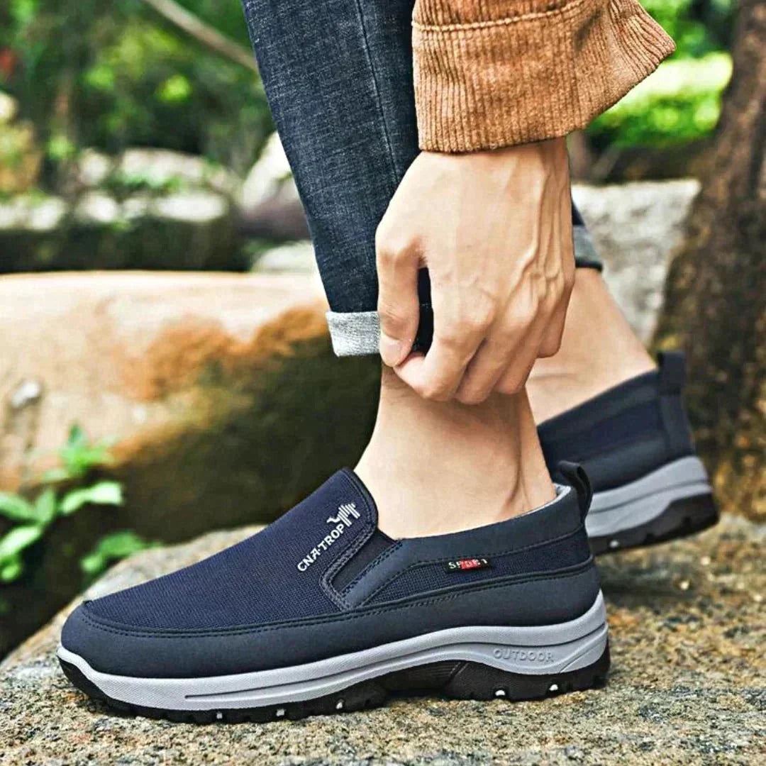 Stylish blue men's orthopedic slip-on shoes, designed for ultimate comfort & essential foot support.