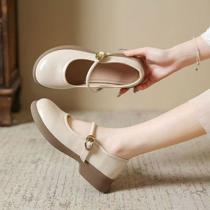 Elegant women's classic buckle strap Mary Jane flats, perfect for professional or casual outfits.
