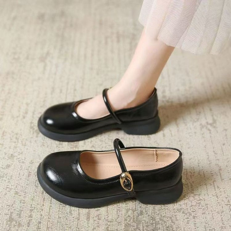 Stylish women's Mary Jane flats with a secure adjustable buckle strap, offering all-day comfort.
