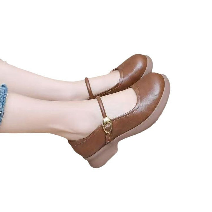 Versatile women's black Mary Jane flats with a comfortable round toe and classic buckle design.