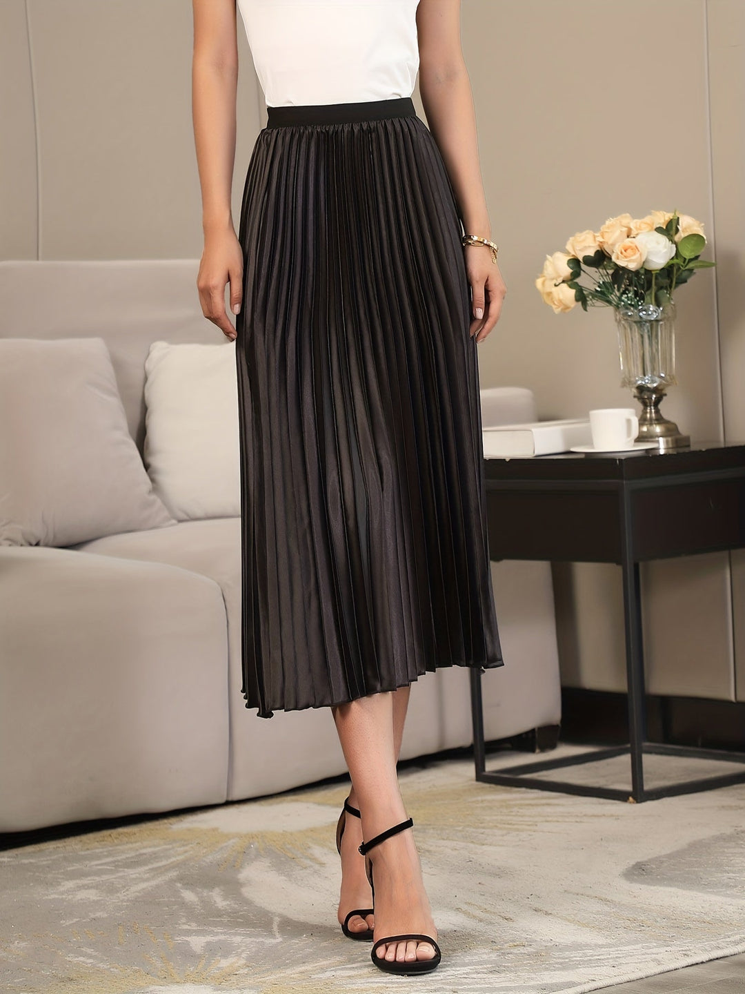 Versatile women's elegant A-line midi skirt, pleated & comfortable for daily wear.