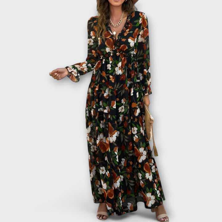 Graceful women's floral print tiered maxi dress, elegant design for any party or gathering.