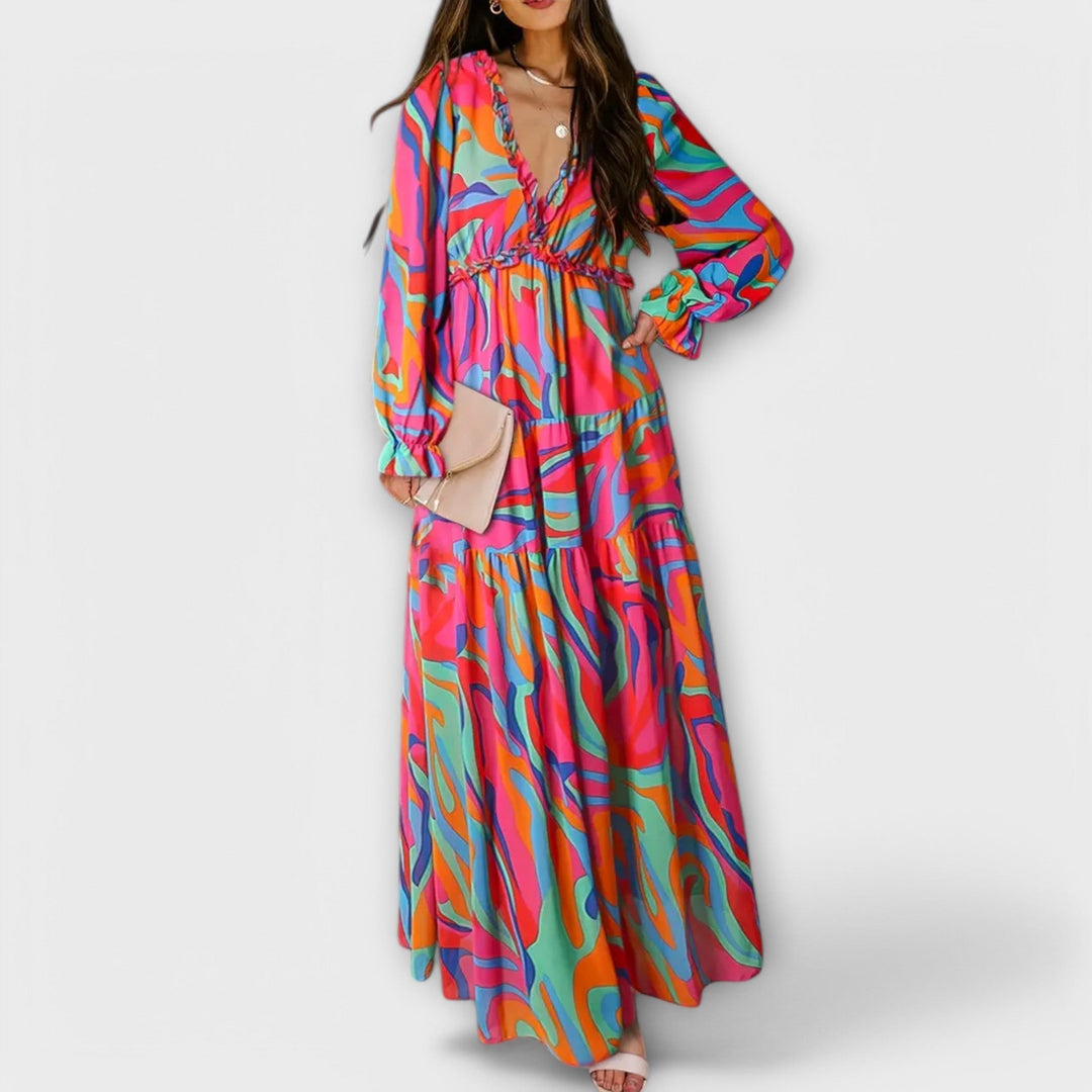 Women's race day ready floral tiered maxi dress, long sleeve, V-neck, sophisticated style.