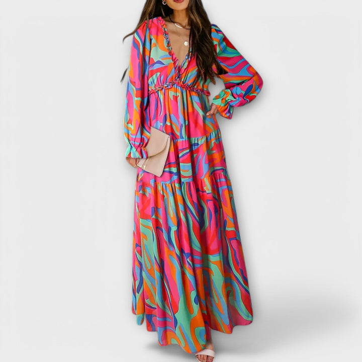 Women's race day ready floral tiered maxi dress, long sleeve, V-neck, sophisticated style.