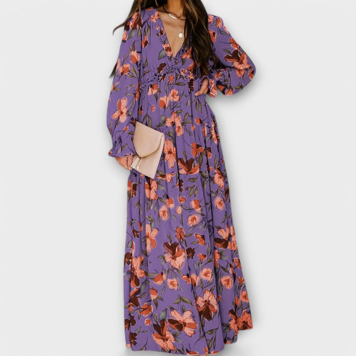 Elegant women's floral print long sleeve tiered maxi dress, perfect for garden parties.