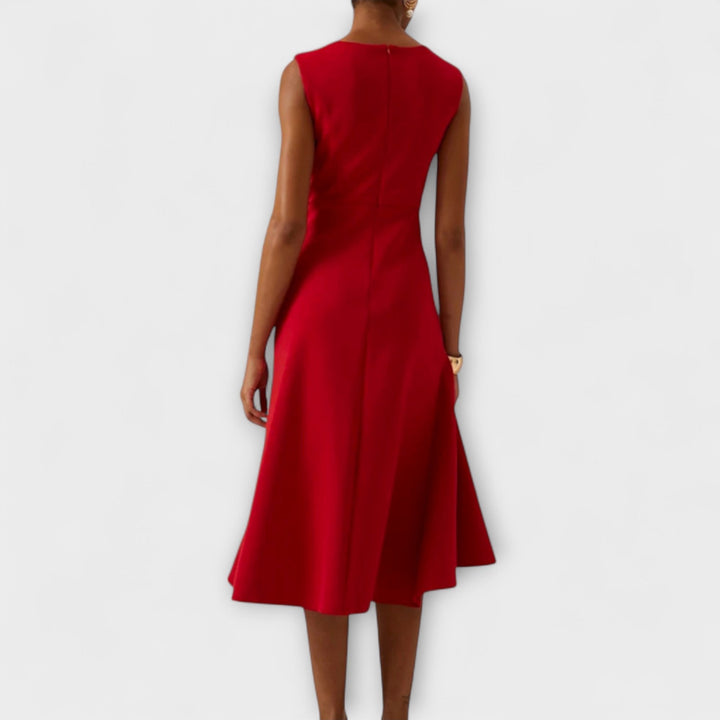 Chic sleeveless women's cocktail midi dress with elegant draping & asymmetric hem for parties.