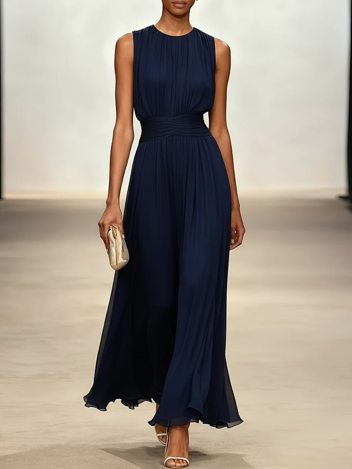 Flowing women's pleated maxi dress with elegant ruched waist. Chic sleeveless summer dress for special events.