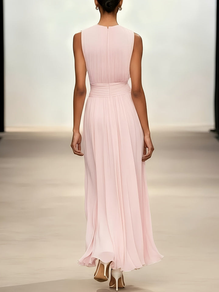 Women's elegant pleated maxi dress, sleeveless, with a distinctive ruched waist. Perfect for sophisticated occasion wear.