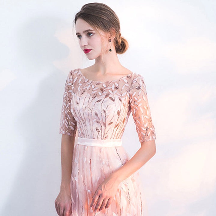 Elegant pink midi dress for women featuring a crew neck & half-sleeves, ideal for versatile autumn fashion.
