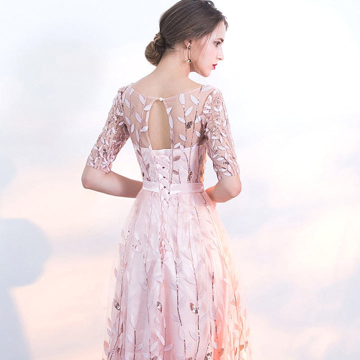 Women's stylish pink crew neck midi dress, half-sleeve design, a versatile and elegant piece for autumn fashion.