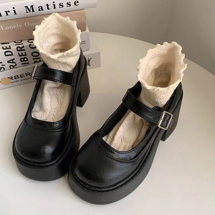 Women's sophisticated platform Mary Jane heels with chunky heel & buckle strap, perfect for elegant dress shoes.