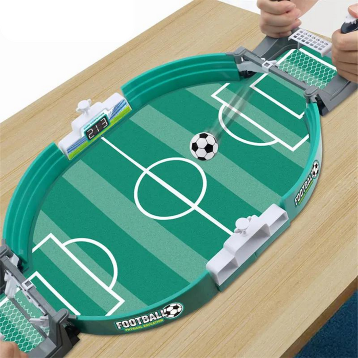 Children playing a vibrant tabletop foosball game, promoting coordination & active indoor fun. Portable mini soccer.