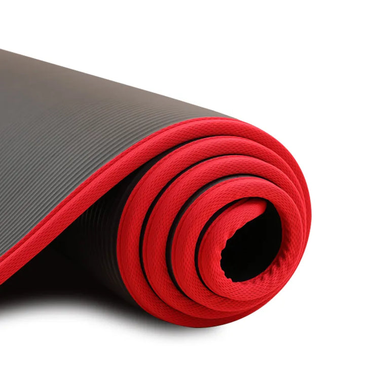 Woman performing yoga on a thick, non-slip fitness mat