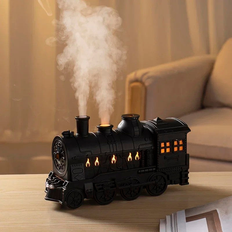 Cool steam locomotive humidifier with LED glow, a unique piece of desktop home decor and room diffuser.