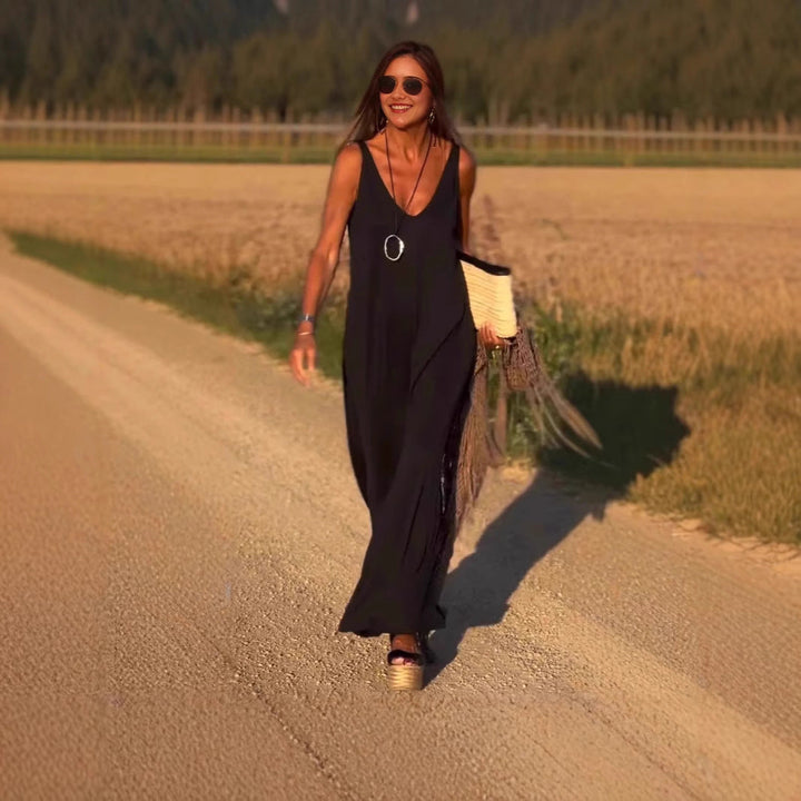 Women's summer sleeveless maxi dress, versatile for elegant or casual wear.