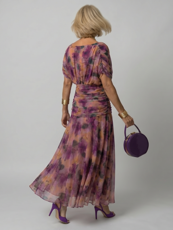 Flowy off-shoulder women's midi dress, elegant and comfortable for summer and evening wear.