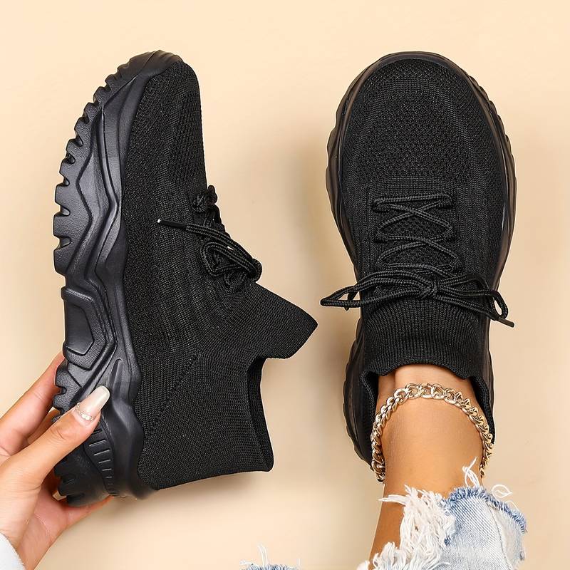 Side view of women's orthopedic walking shoes, showcasing integrated arch support for effective pain relief.
