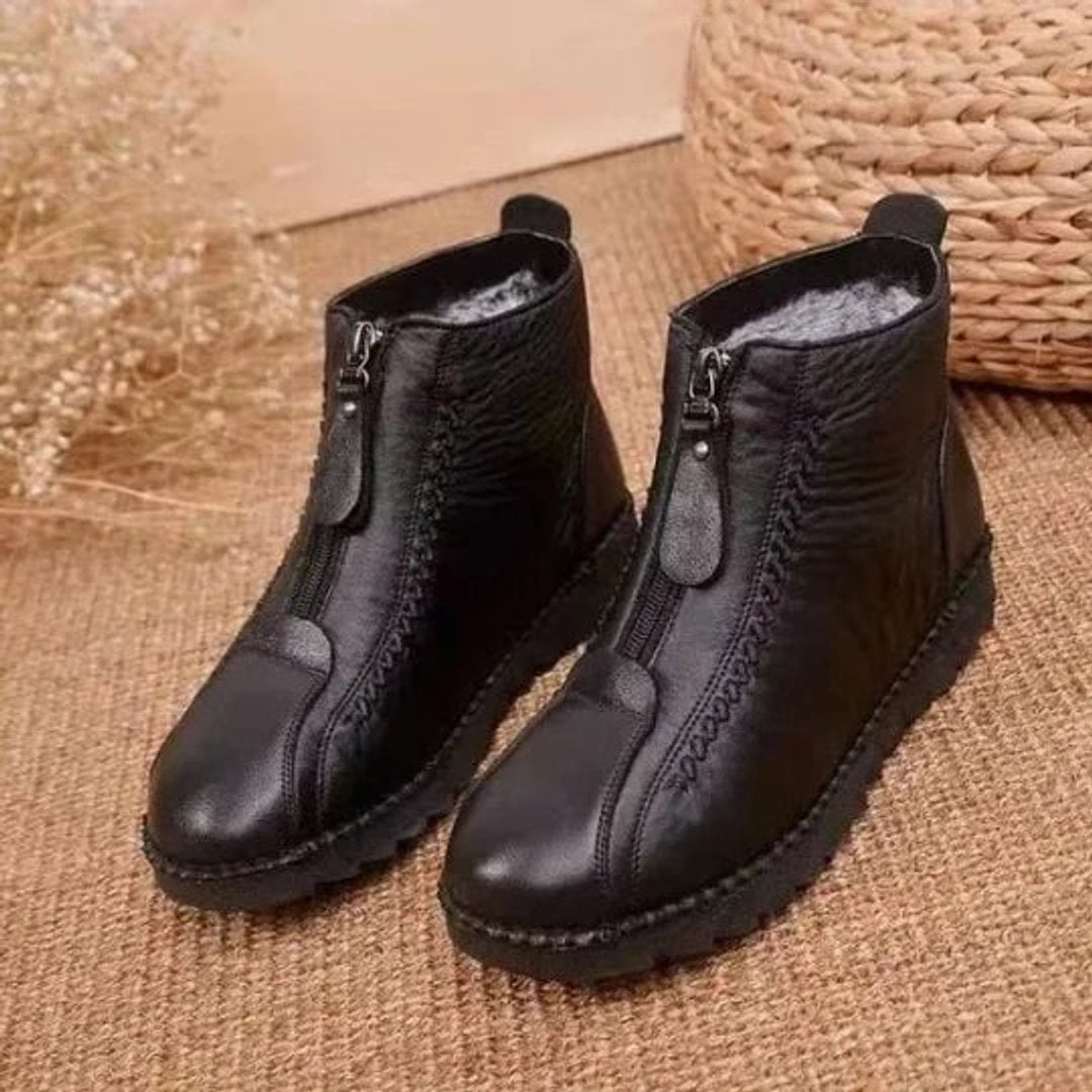 Comfortable women's ankle boots for cold weather. Warm, slip-resistant design, ideal for winter walking & casual wear.