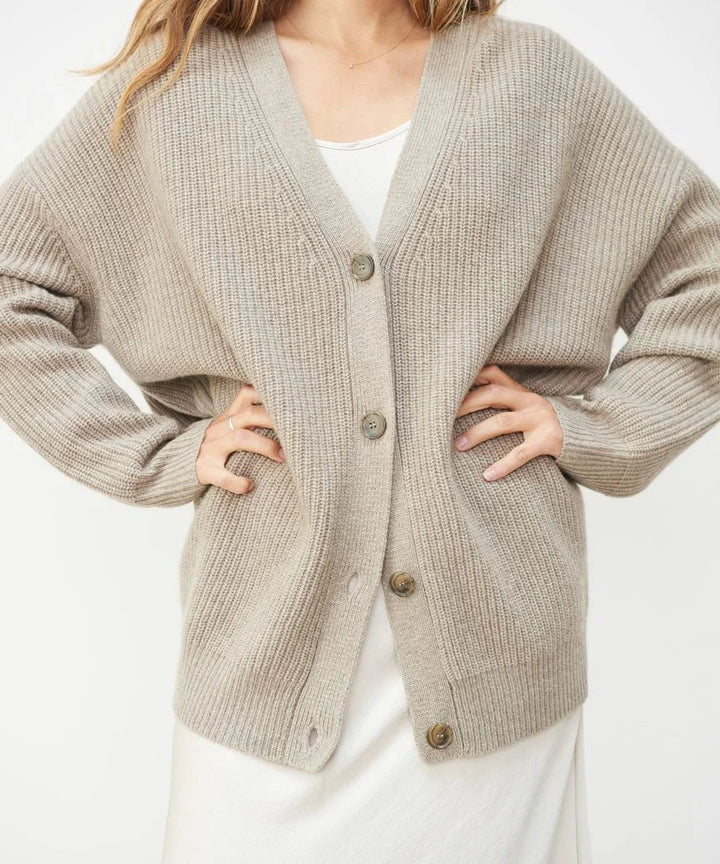 Fall fashion elegant women's cardigan jumper. Cozy & stylish for autumn layering.