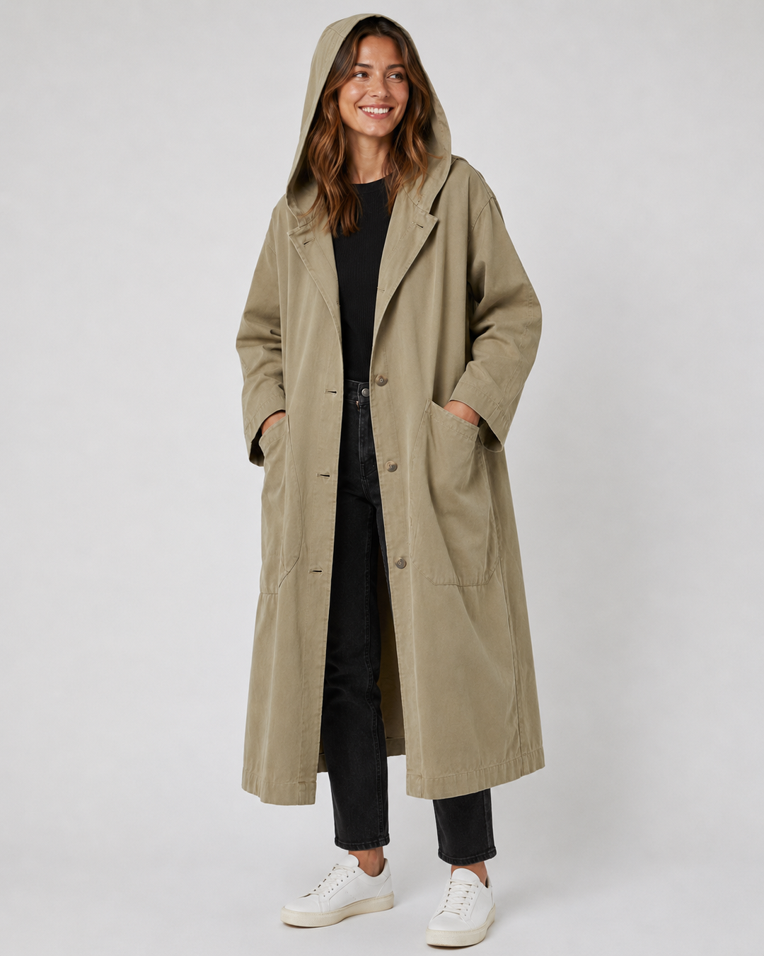 Stylish women's long waterproof trench coat, ideal as a chic rain jacket for outerwear.