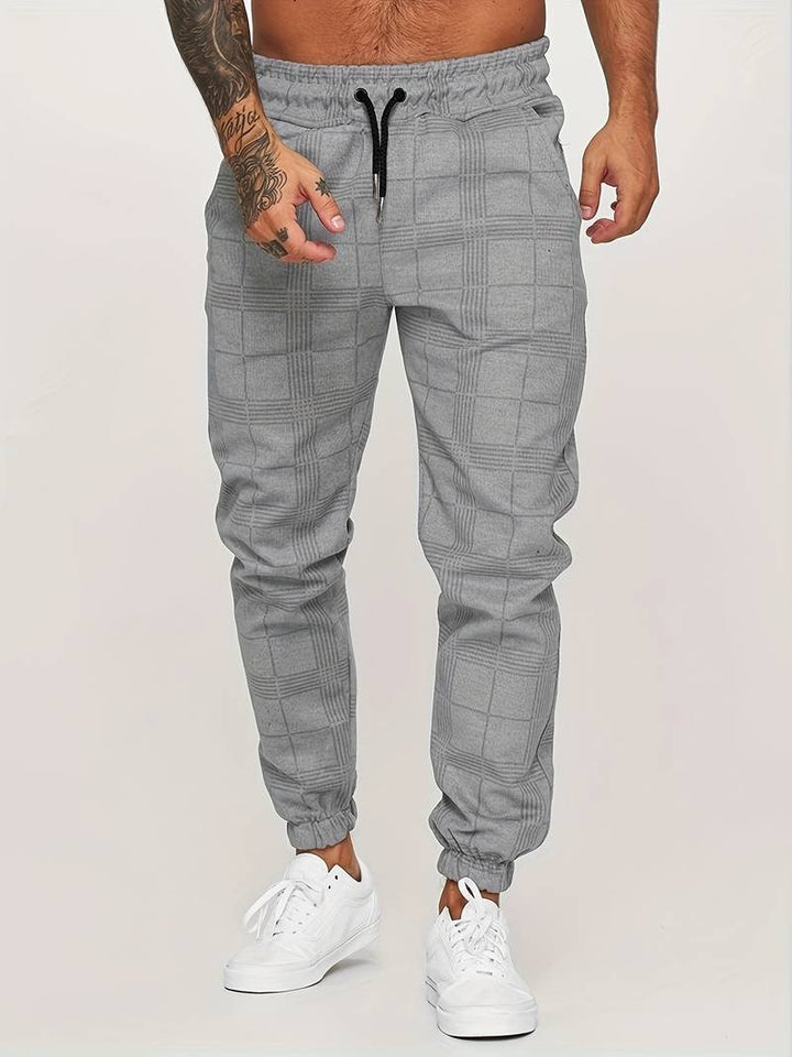 Men's modern checked jogger pants for ultimate comfort. Relaxed fit, perfect for casual wear & travel.