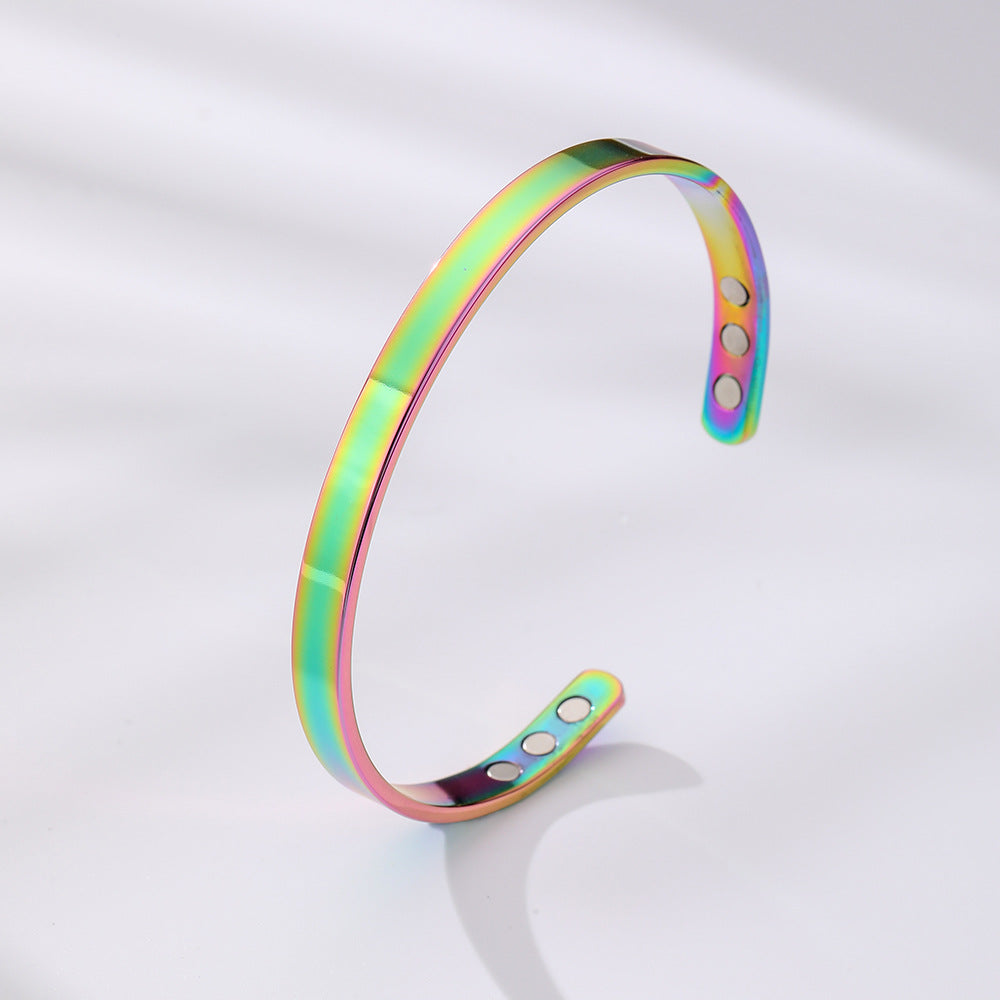 Stylish wide glossy stainless steel magnetic bracelet. Unisex cuff, modern elegance for any outfit.